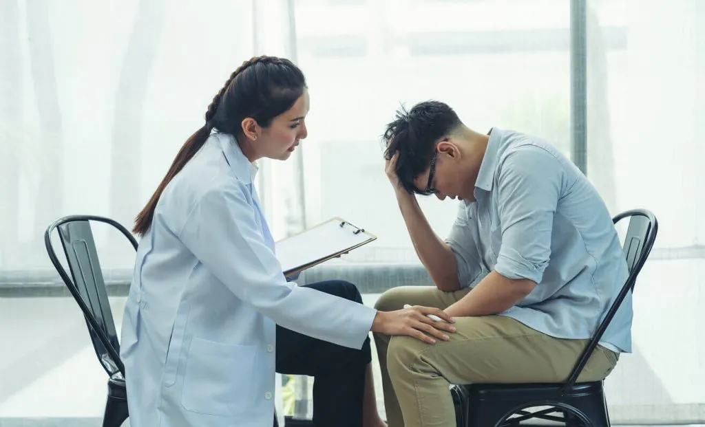 Man with Therapist