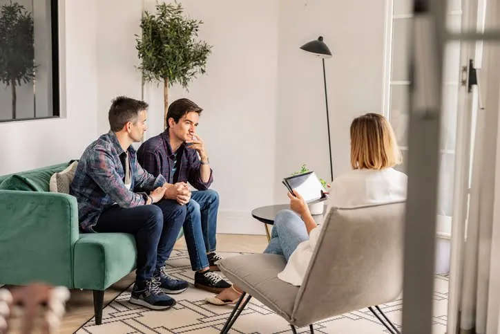 Couple meeting with therapist